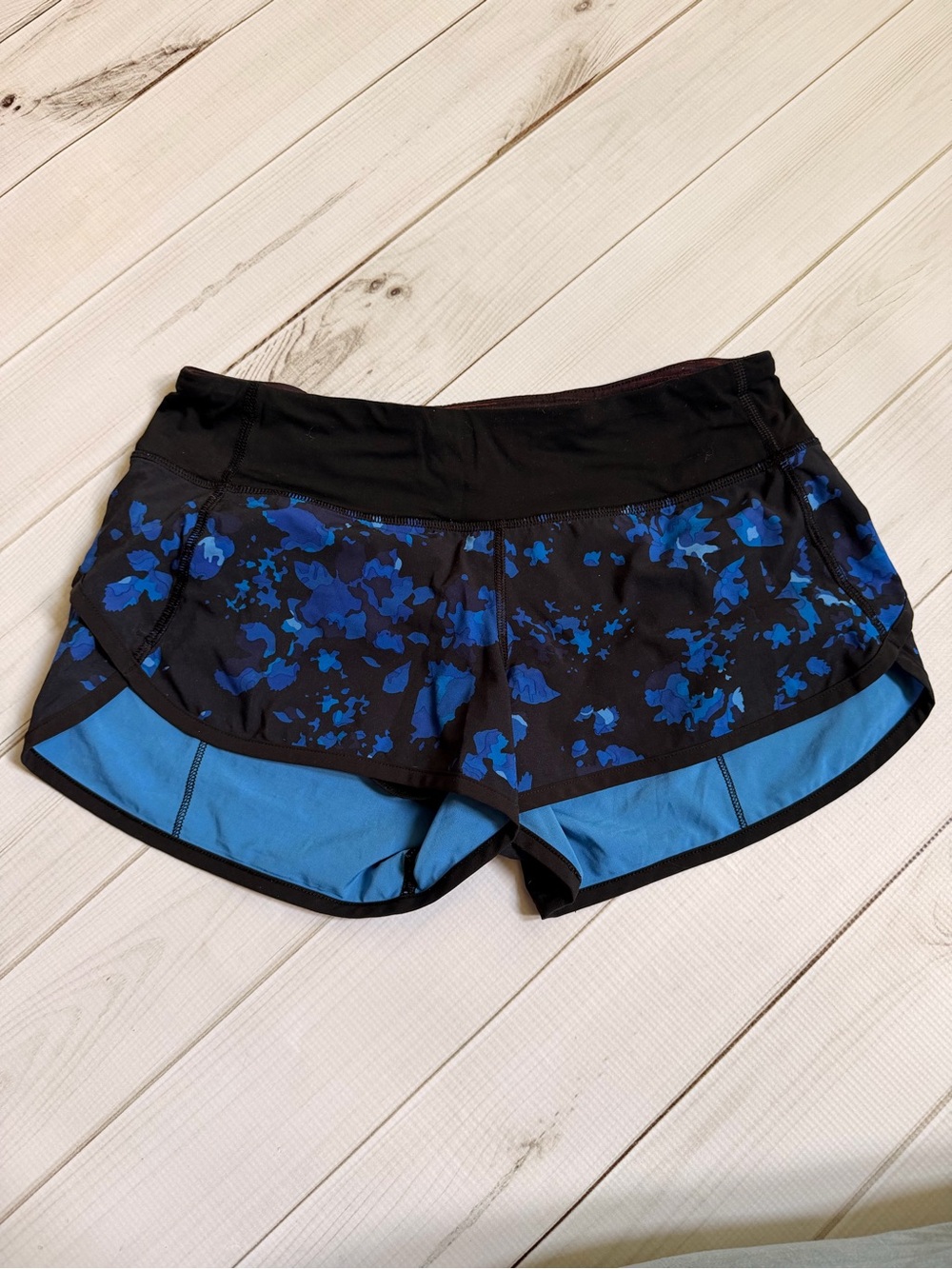 lululemon athletica Black Shorts with Blue Floral Overlay